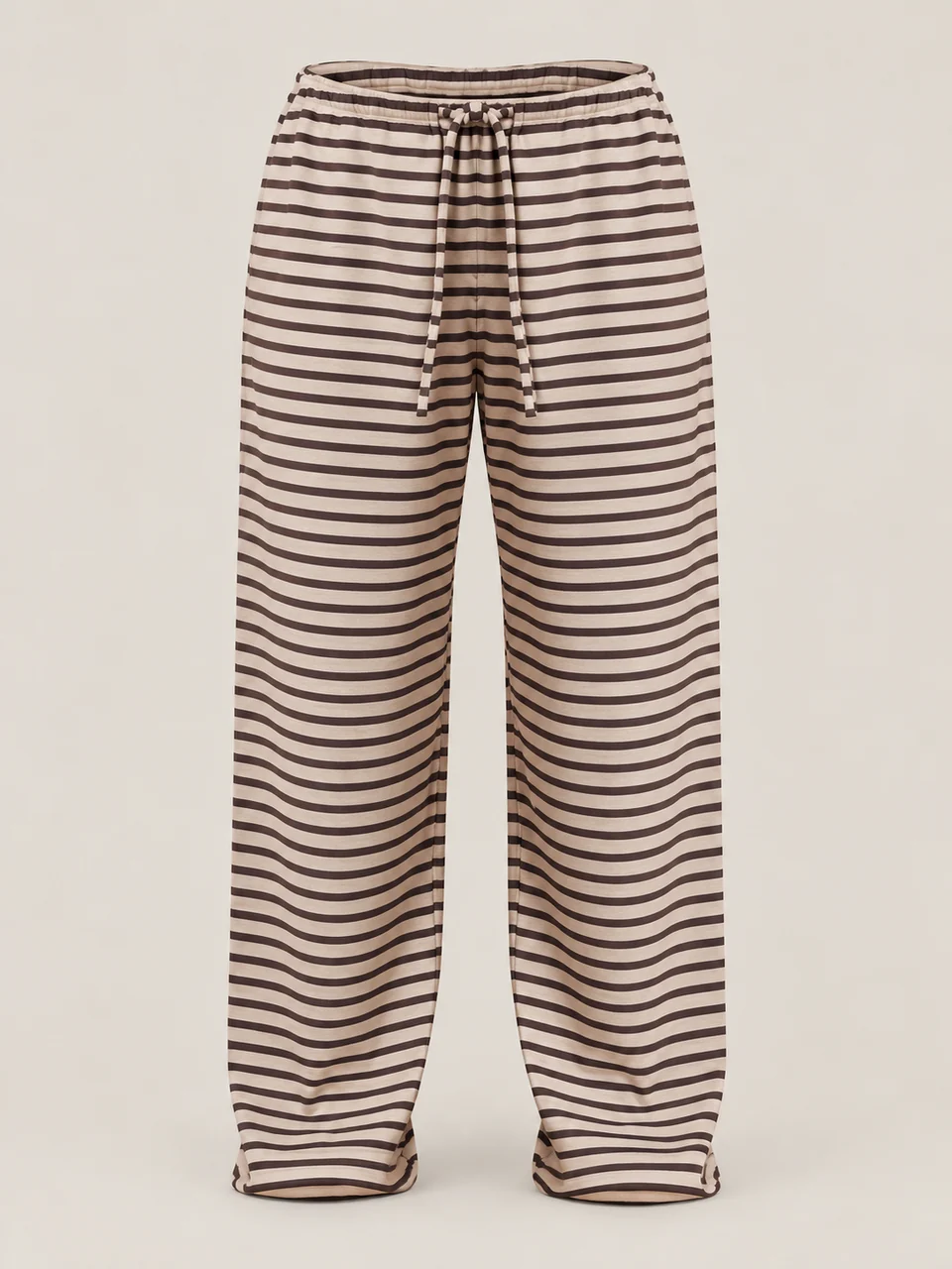 Cream and brown horizontally striped relaxed trousers with a gathered drawstring waist and long legs